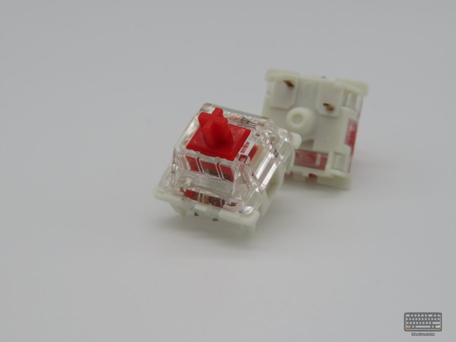 Par de switches Gateron Red mostrando frontal y trasera del mismo switch, tacto lineal y suave, se vende suelto