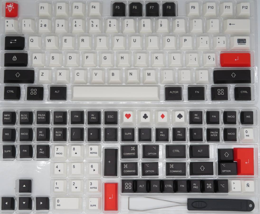 Set completo de teclas en español perfil cherry en colores blanco, negro y rojo, en bandejas. JOKER.