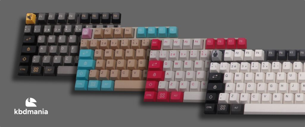 Sets de keycaps ISO-ANSI, PC y MAC. Colores blanco, negro, gris, fucsia, celeste, crema, gris.